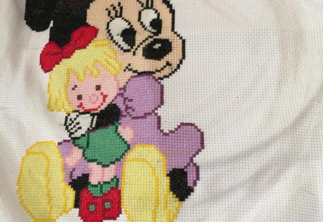 Baby Minnie with doll cross stitch work photo Facebook Fan Joanne Powell