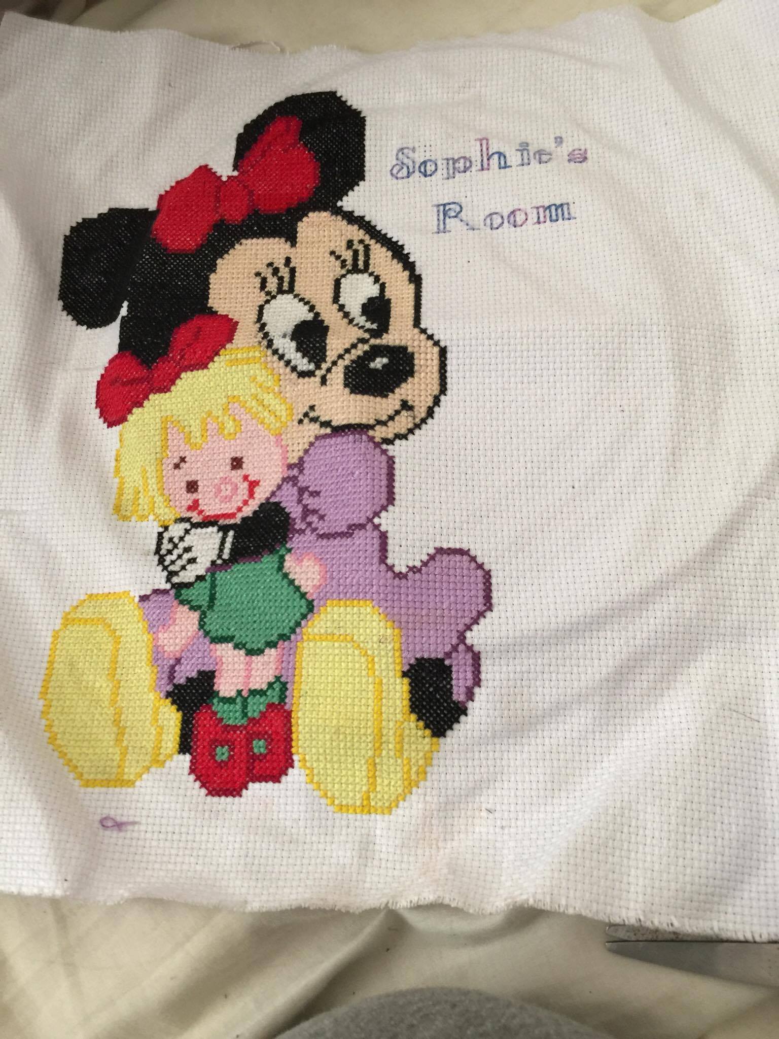 Baby Minnie with doll cross stitch work photo Facebook Fan Joanne Powell