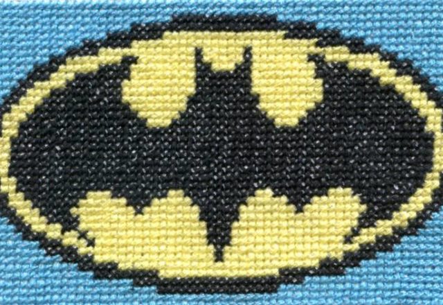 Batman logo cross stitch work photo by Facebook Fan Timea Cseke