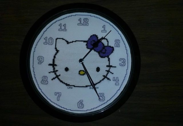 Cross stitch clock with Hello Kitty work photo author facebook user Carrie Renae Uetz
