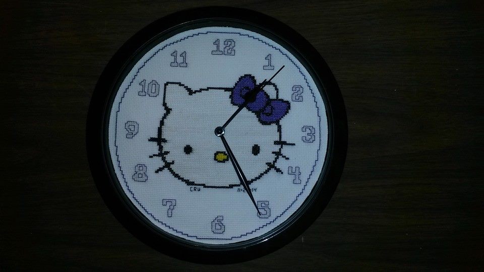 Cross stitch clock with Hello Kitty work photo author facebook user Carrie Renae Uetz