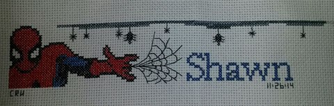 Cross stitch name Shawn work photo with Spiderman author facebook user Carrie Renae Uetz