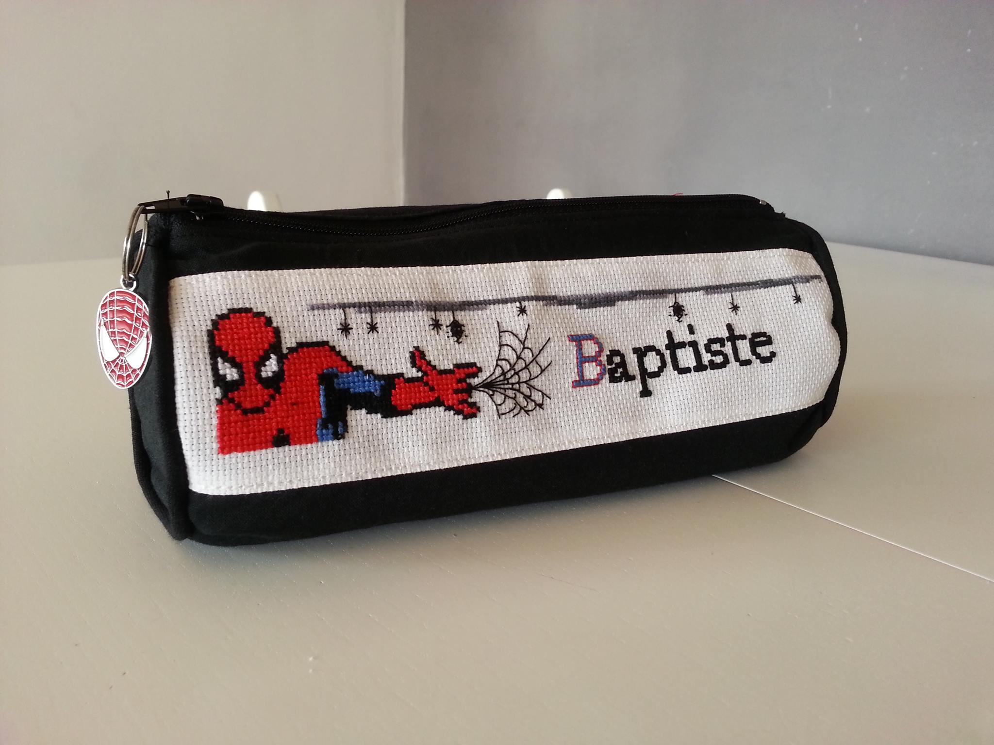 Cross stitch name with Spiderman on a pencil case cross stitch work author Facebook User Christelle Portevin